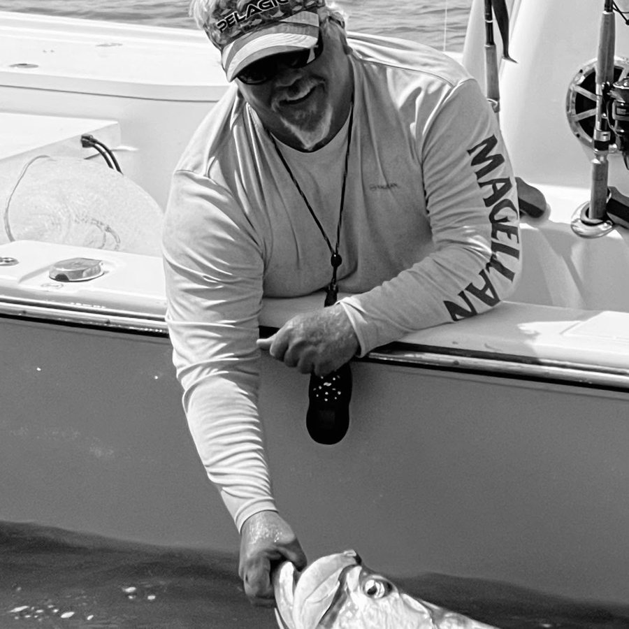 Capt. Chip Wingo releasing a tarpon