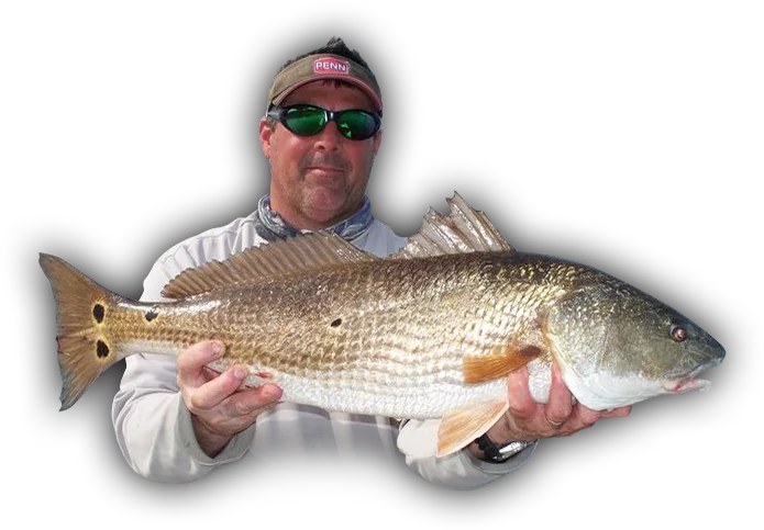 Capt. Ron Schurr holding a redfish